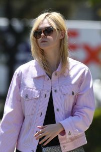 Elle Fanning Pink Denim Bomber Jacket.