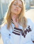 Stella Maxwell White Satin Varsity Bomber Jacket.