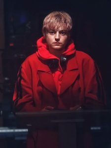 Darby Hart A Murder At The End Of The World S01 Emma Corrin Red Trench Coat