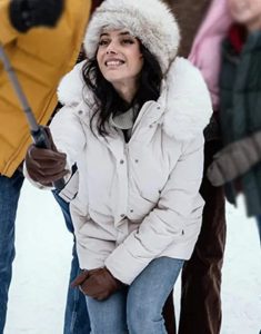 Carol There’s Something In The Barn 2023 Amrita Acharia White Hooded Jacket.