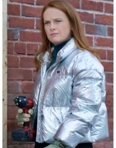 Olivia Film Our Christmas Mural 2023 Alex Paxton Beesley Silver Puffer Jacket