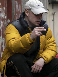 Movie-Kneecap-2024-Naoise-Black-and-Yellow-Puffer-Jacket