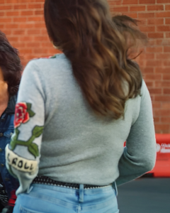 Hustlers Take All 2024 Carole Davis Knitted V Neck Sweater